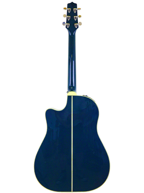 Featuring the Takamine LTD2021 "Blue Rose," this blue acoustic guitar stands out against a bright white background.