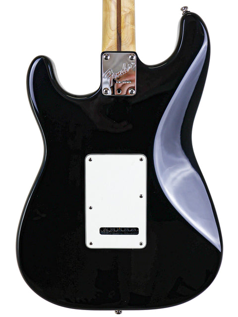Fender American Standard Stratocaster in black, model Strat Plus Ultra, USA 1993, highlighting its classic electric guitar features.
