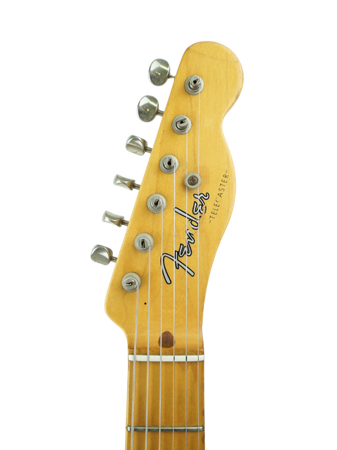 Fender Custom Shop Stratocaster in yellow, highlighting premium quality and vintage style from the USA, 2012 edition.