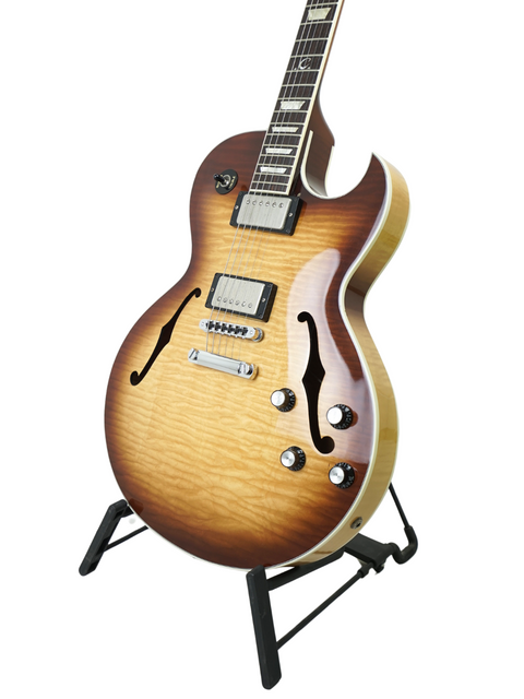 Gibson Custom ES-137 Classic guitar displayed on a stand, set against a bright white background, highlighting its craftsmanship.