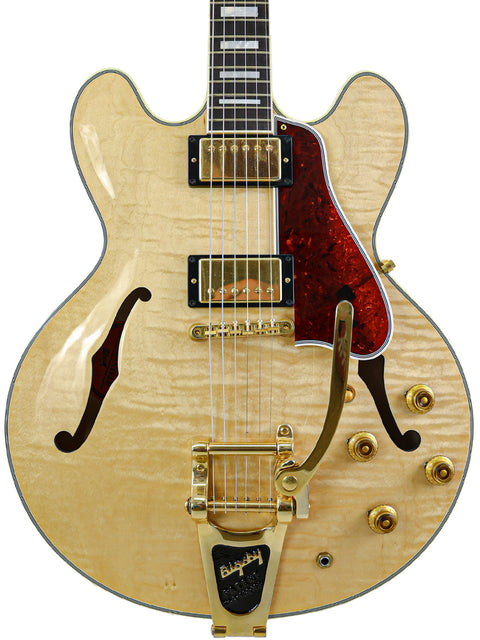 Gibson Custom Shop ES-355 guitar featuring a gold body and red pickguard, made in the USA in 2011.