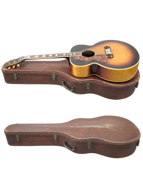 Inside a guitar case, a 1955 Left-Handed Gibson J-200 rests, embodying vintage charm and exceptional craftsmanship.