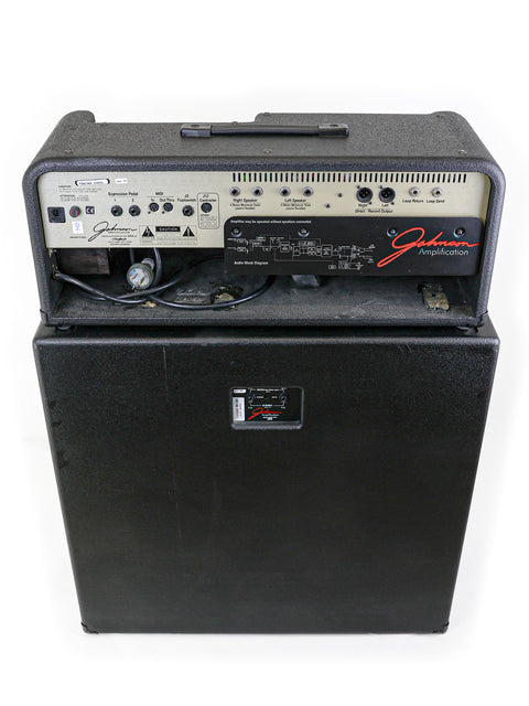Johnson Millennium Stereo 250 Modeling Amplifier (1998) paired with a Fender Stratocaster, highlighting its modern features and style.
