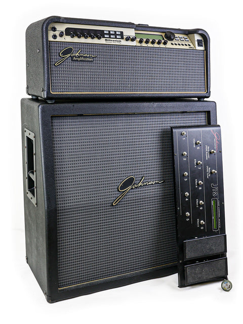 Johnson Millennium Stereo 250 Modeling Amplifier (1998) with a remote control, showcasing its sleek design and functionality.