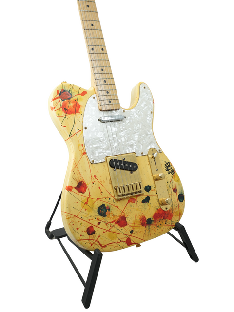 Limited edition 1994 David Hart Guitars Pro Hart Telecaster with vibrant paint splatter design, showcasing artistic flair.