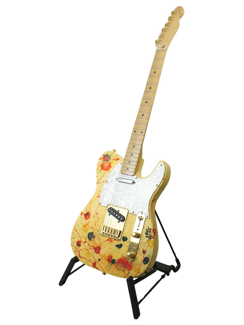  Limited edition David Hart Telecaster with stunning floral artwork, showcasing a unique blend of music and nature.
