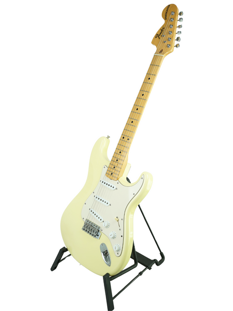 Limited edition white electric guitar on a stand, highlighting the Fender Custom Shop craftsmanship from 2006.