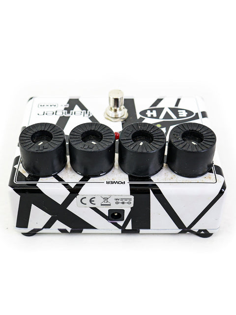 MXR EVH117 Flanger pedal in black and white, showcasing four adjustable knobs for versatile guitar sound effects.