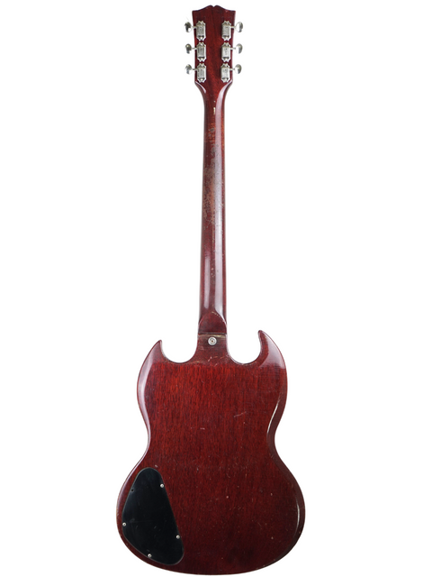 Mahogany-bodied 1967 Gibson SG Special electric guitar, showcasing a classic black pickguard design.