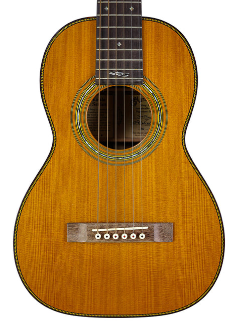 Martin Sting Mini Signature Edition guitar, #35 of 100, signed by Sting, displayed on a clean white background.
