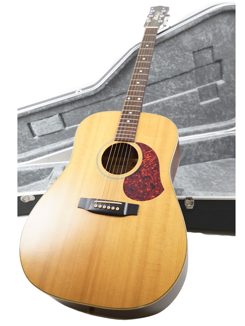 Maton CW80/6 guitar from 1991 rests inside its case, showcasing its craftsmanship and vintage appeal.