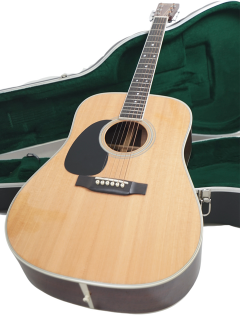 On a white background, a Martin D-35 Left-Handed acoustic guitar from 2009 is shown in its protective case.