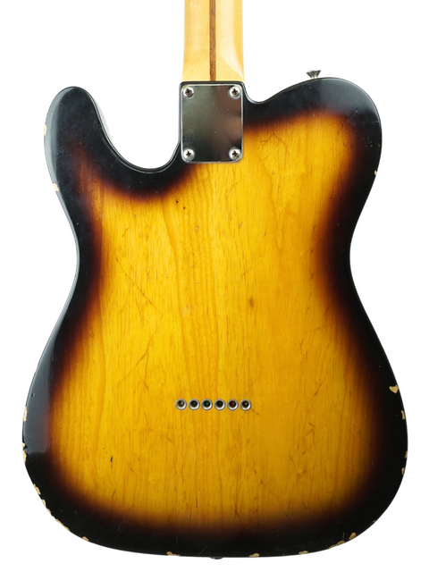 Rear angle of a 2012 Fender Custom Shop 50's Telecaster NOS showcasing its vibrant sunburst finish.
