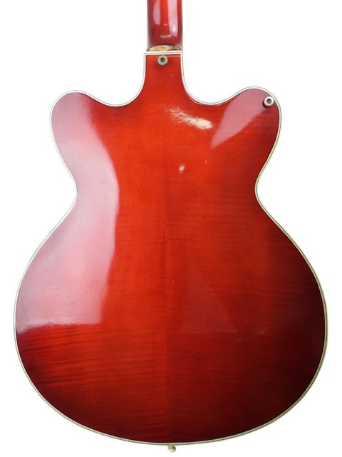 Rear perspective of a 1961 Hofner Verithin Bass, showcasing its vibrant red body and vintage craftsmanship from Germany.
