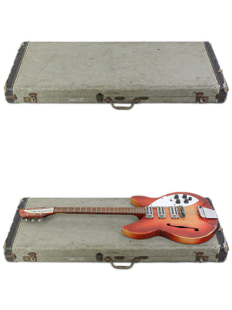 Red and white case holding a vintage Rickenbacker 1998 guitar, with an additional case featuring a guitar inside.