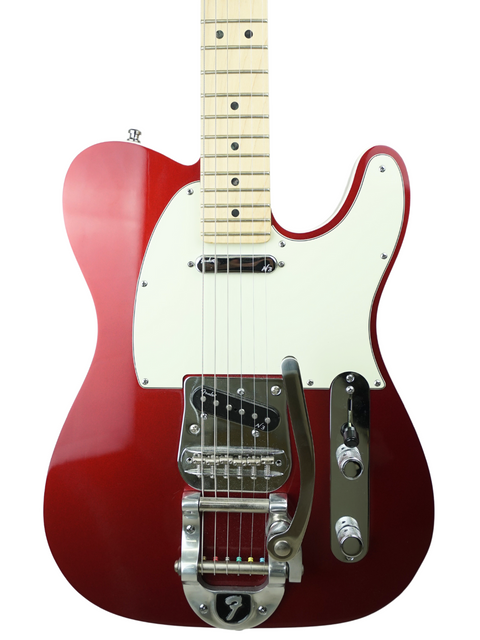 Red electric guitar with a white pickguard and a Bigsby tremolo, isolated on white background.