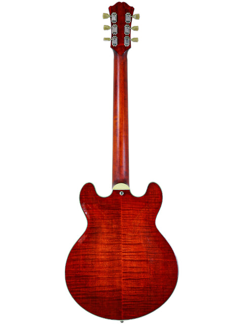 Red electric guitar with visible wood grain, white background.