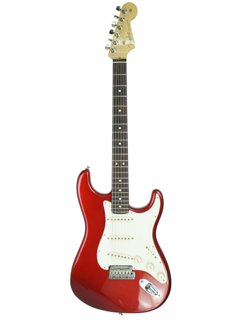 Red electric guitar with white pickguard isolated on white background.