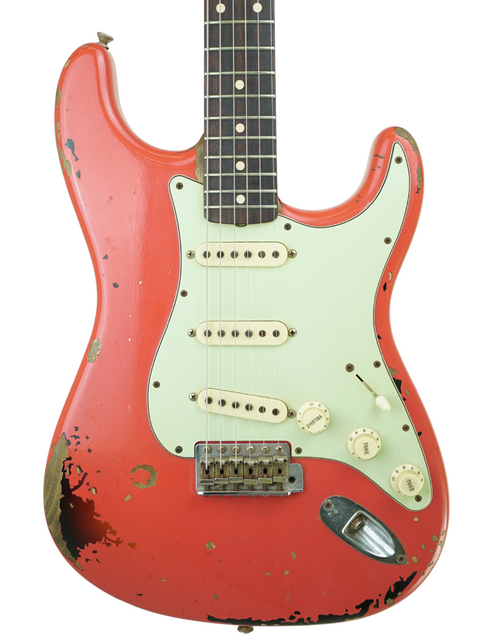 Red relic Fender Custom Shop '63 Stratocaster with a white pickguard, crafted in the USA in 2015.