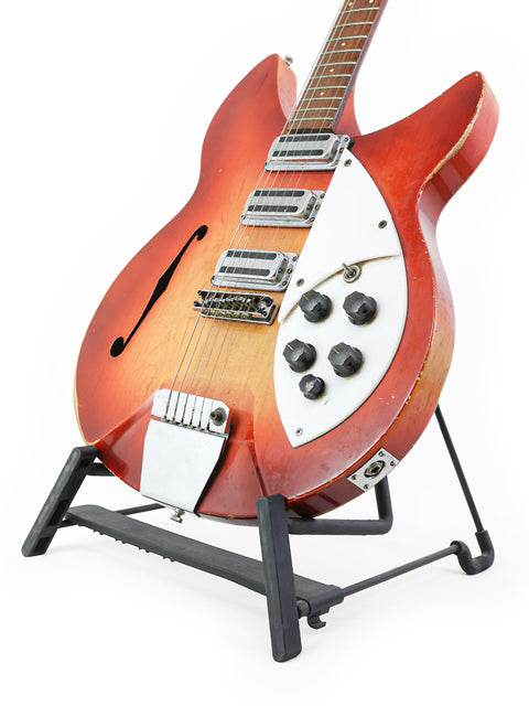 Rickenbacker 1998 (345) guitar in vintage style, resting on a stand with a plain white background.