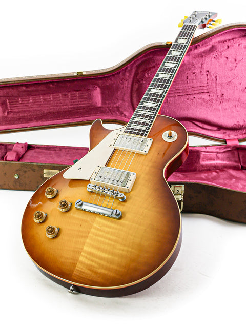 Stunning Gibson Custom Shop LPR-8 Left-Handed guitar with a protective case, highlighting its 2014 USA craftsmanship.
