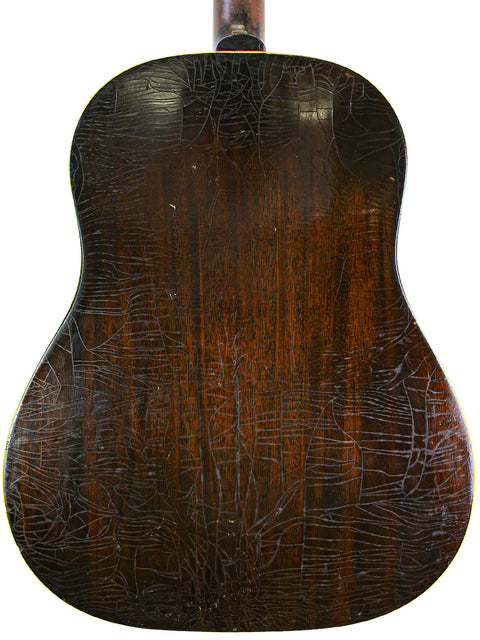 Stunning back of a 1951 Gibson D-18B, a classic vintage guitar known for its exceptional sound and craftsmanship.