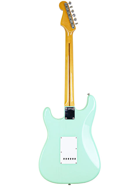 Stunning mint green Fender AVRI '57 Stratocaster, a vintage 1985 model that embodies American guitar heritage.