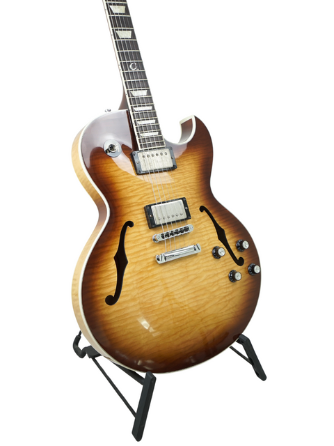 Sunburst-finished Gibson Custom ES-137 Classic guitar from 2009, showcasing its elegant design and craftsmanship.