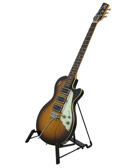 Sunburst electric guitar on a black stand against a white background.