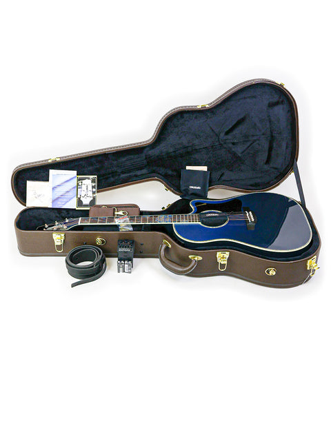 Takamine LTD2021 "Blue Rose" acoustic guitar in blue, with a case and accessories, perfect for music lovers and collectors.