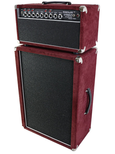 The Amplified Nation Wonderland Overdrive V2 features a striking red and black design with a protective black cover.