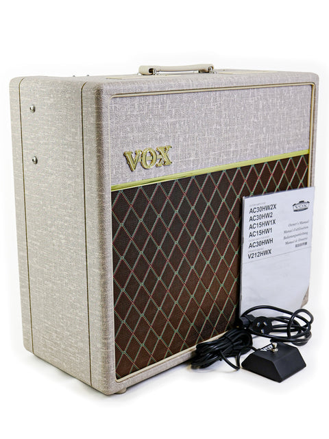 The Vox AC15 15W 2x12 combo amp, known for its classic tone and modern features, ideal for gigs and practice.