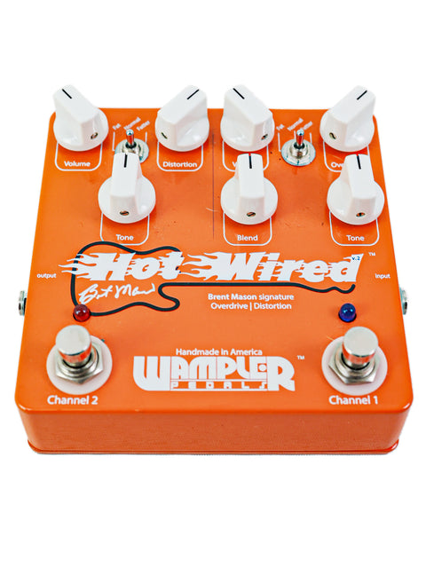 The Wampler Brent Mason Hot-Wired pedal from 2012, showcasing the phrase "hot wired" on its surface.