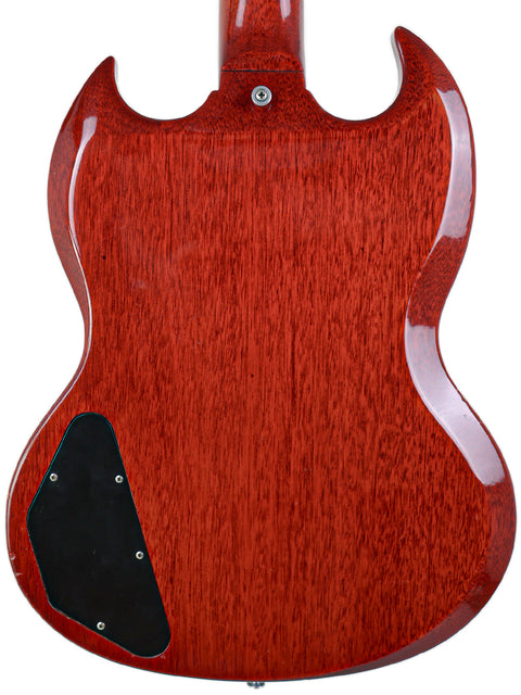The back of a 1964/5 Gibson SG Special guitar showcasing its vibrant red body.
