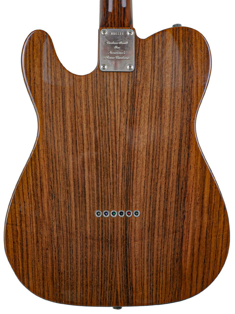 The back of a 2003 Fender Masterbuilt Telecaster, featuring a beautifully crafted wooden body and limited edition design.