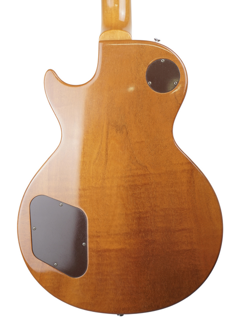 The back of a 2011 Gibson Custom Historic VOS LPR-6 1956 Reissue Gold Top guitar showcasing its wooden body.