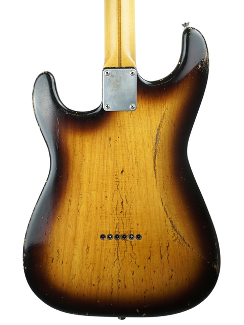 The back of a sunburst electric guitar, featuring the Nacho Guitars 50s Stratocaster, crafted in Spain, 2024.