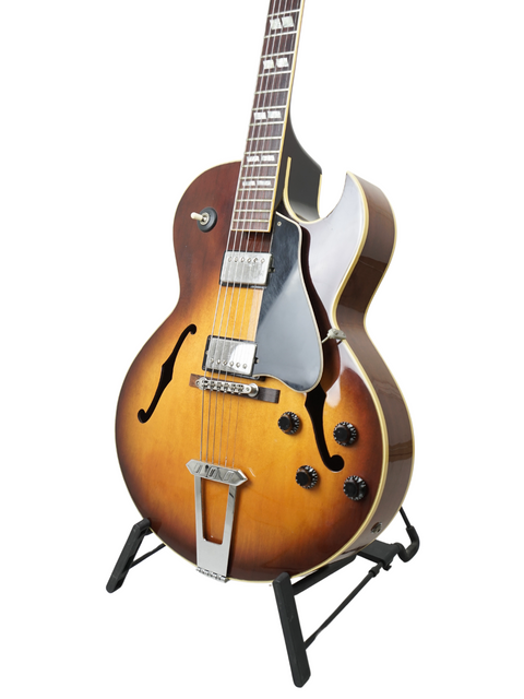 The classic 1986 Gibson ES-175 guitar stands proudly on a display, embodying timeless style and musical heritage.
