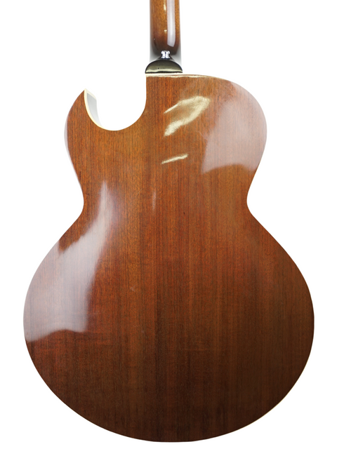 The elegant wooden back of a 1986 Vintage Gibson ES-175 guitar, highlighting its classic craftsmanship.