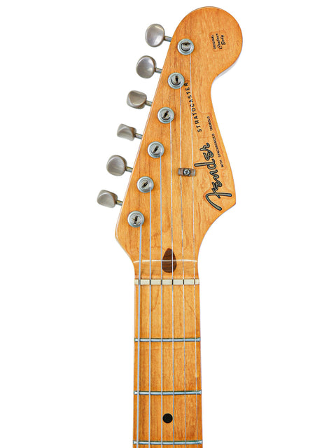 The iconic 1982 Fender AVRI ‘57 Stratocaster electric guitar, blending vintage style with exceptional sound quality.