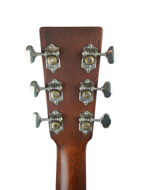The neck of a 2014 Martin D-15M acoustic guitar, complete with four knobs, emphasizing its elegant design and functionality.