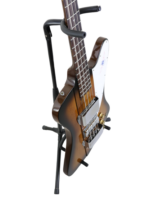 The vintage Gibson Bicentennial Thunderbird IV Bass from 1976 is displayed on a stand, emphasizing its timeless appeal and artistry.