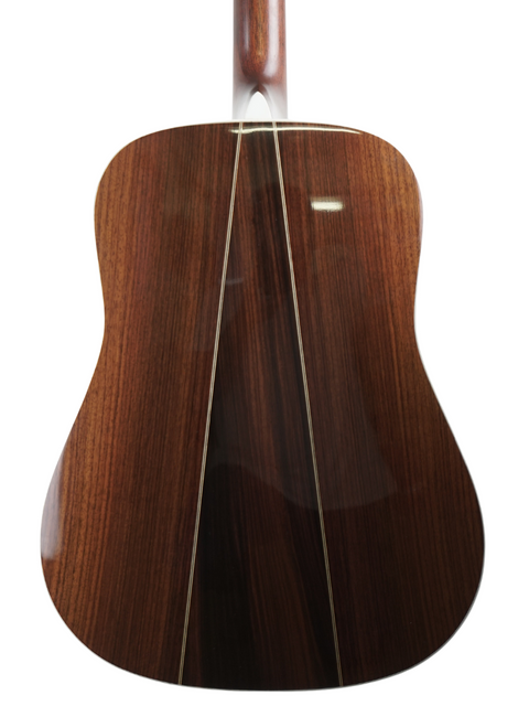 The wooden back of a 2009 Martin D-35 Left-Handed acoustic guitar, highlighting its craftsmanship and rich texture.