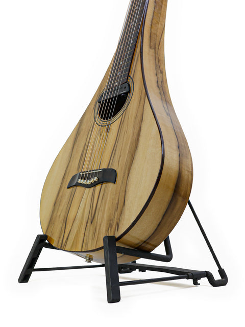 Tim Kill Custom Teardrop guitar from 2013 on a stand, highlighting its stunning wooden body design.
