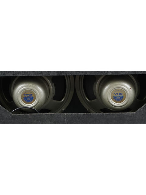 Two classic Vox AC-30 Top Boost speakers from 1975, neatly arranged in a box on a white background.