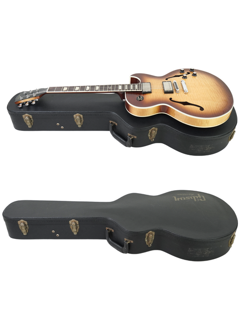 Two guitars in a case, featuring a Gibson Custom ES-137 Classic from the USA, 2009, neatly stored together.