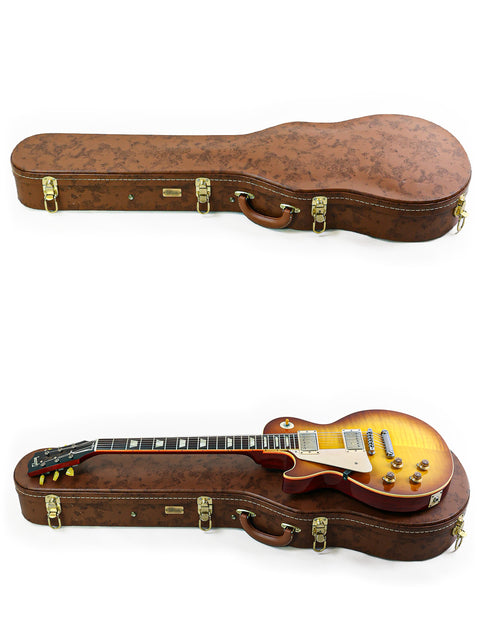 Two guitars nestled in a case, including a Gibson Custom Shop LPR-8 Left-Handed from 2014, topped with another case.
