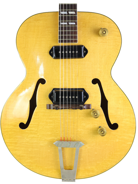Vintage 1952 Gibson ES-300 guitar in yellow with a black pick guard, a stunning piece for any music enthusiast.
