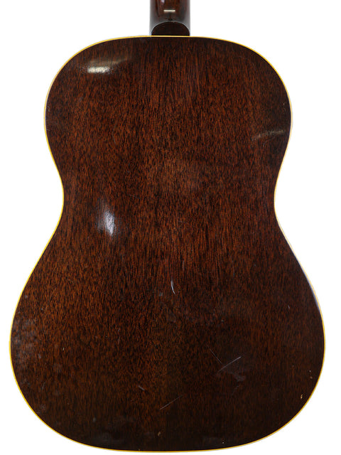 Vintage 1954 Gibson LG-1 acoustic guitar, highlighting the rich history and quality of Gibson's American-made instruments.