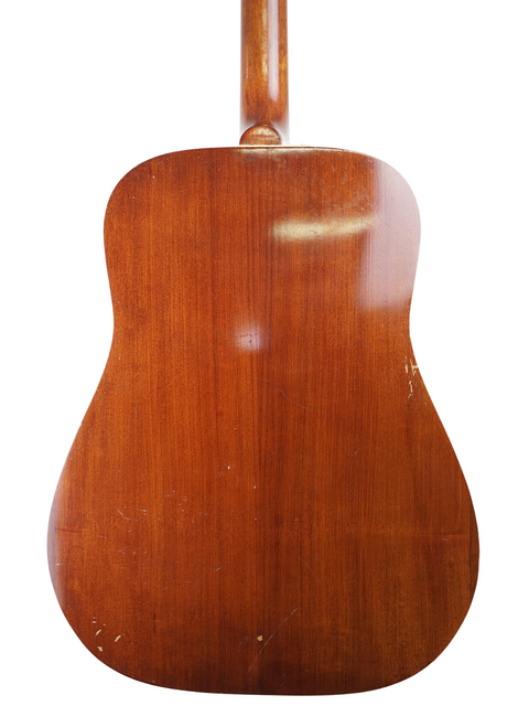 Vintage 1955 Gibson D-28 acoustic guitar alongside a 1972 Maton FG100, showcasing classic craftsmanship and design.